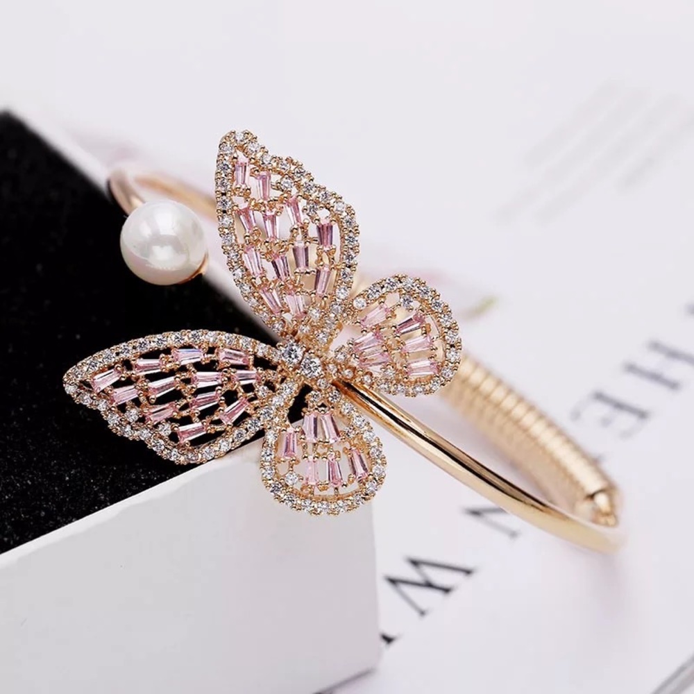 Butterfly arm clamp bracelet
